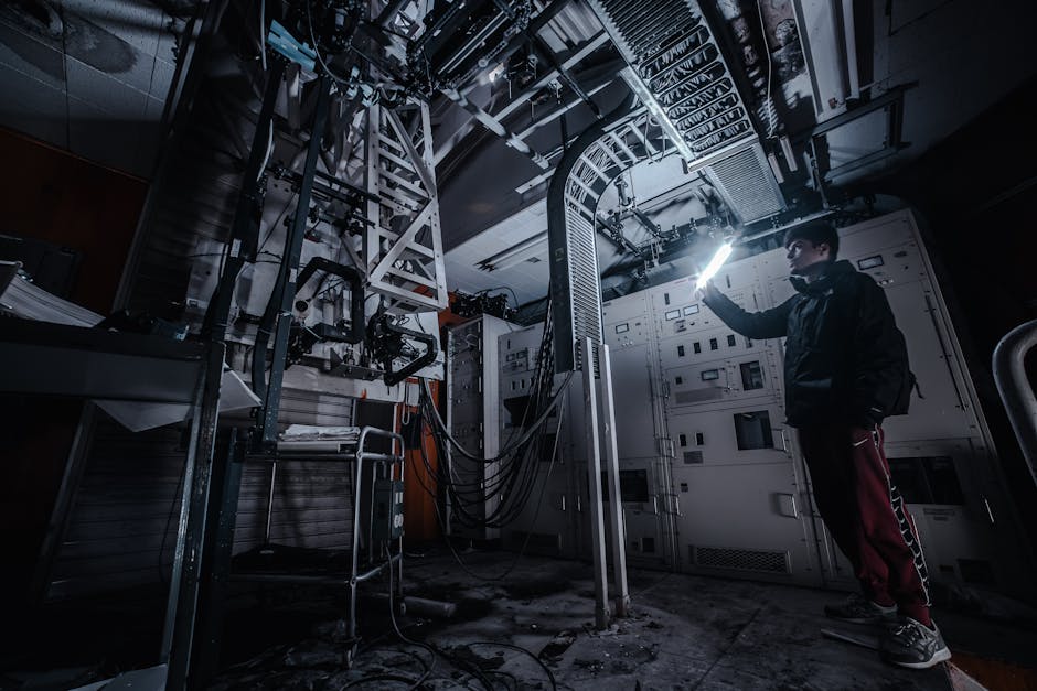 technician inspecting a commercial air duct with a flashlight - commercial air duct cleaning beaver falls pa technician inspecting a commercial air duct with a flashlight - commercial air duct cleaning beaver falls pa