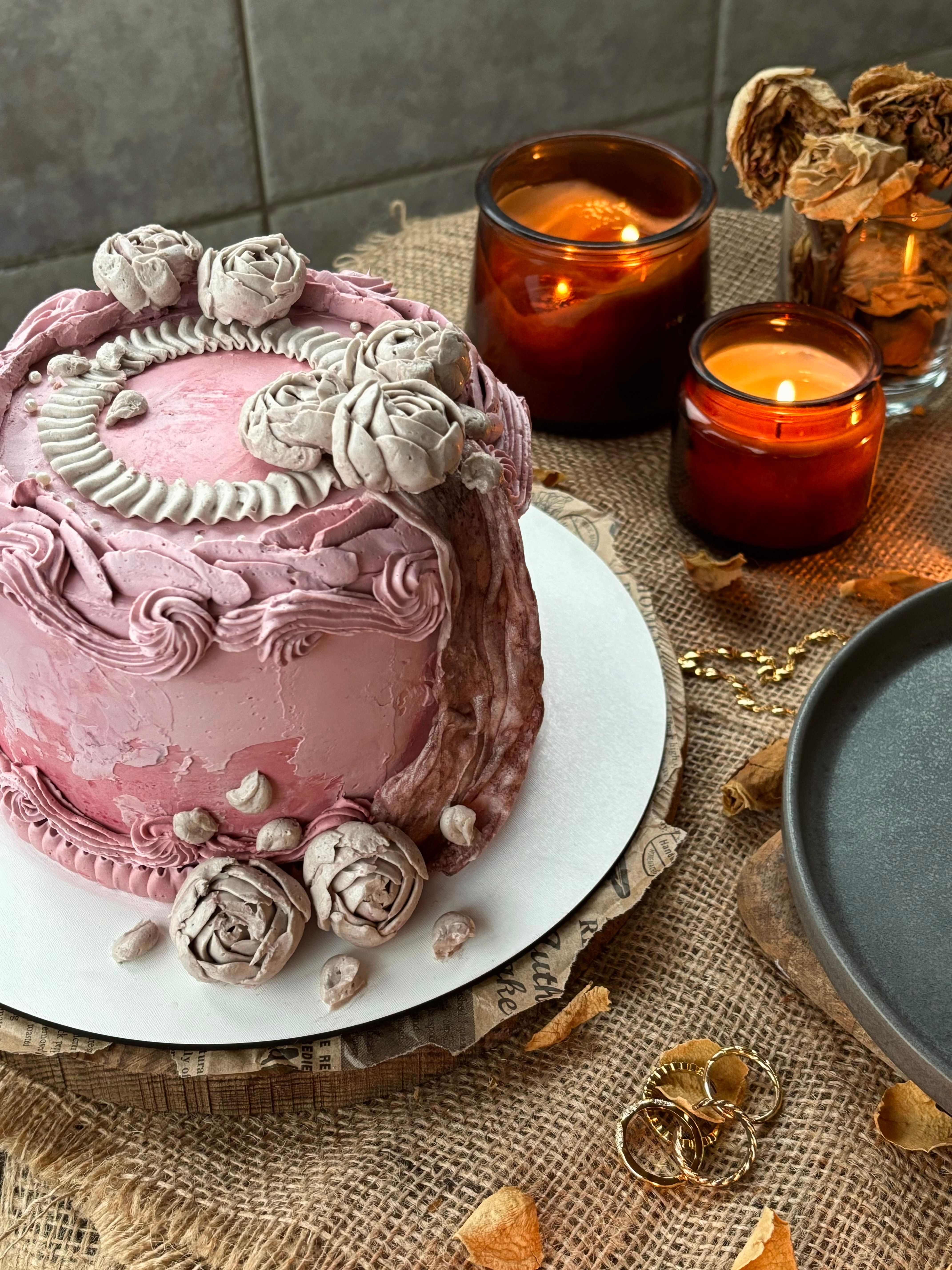 Rustic Pink Cake with Candles and Dried Flowers · Free Stock Photo
