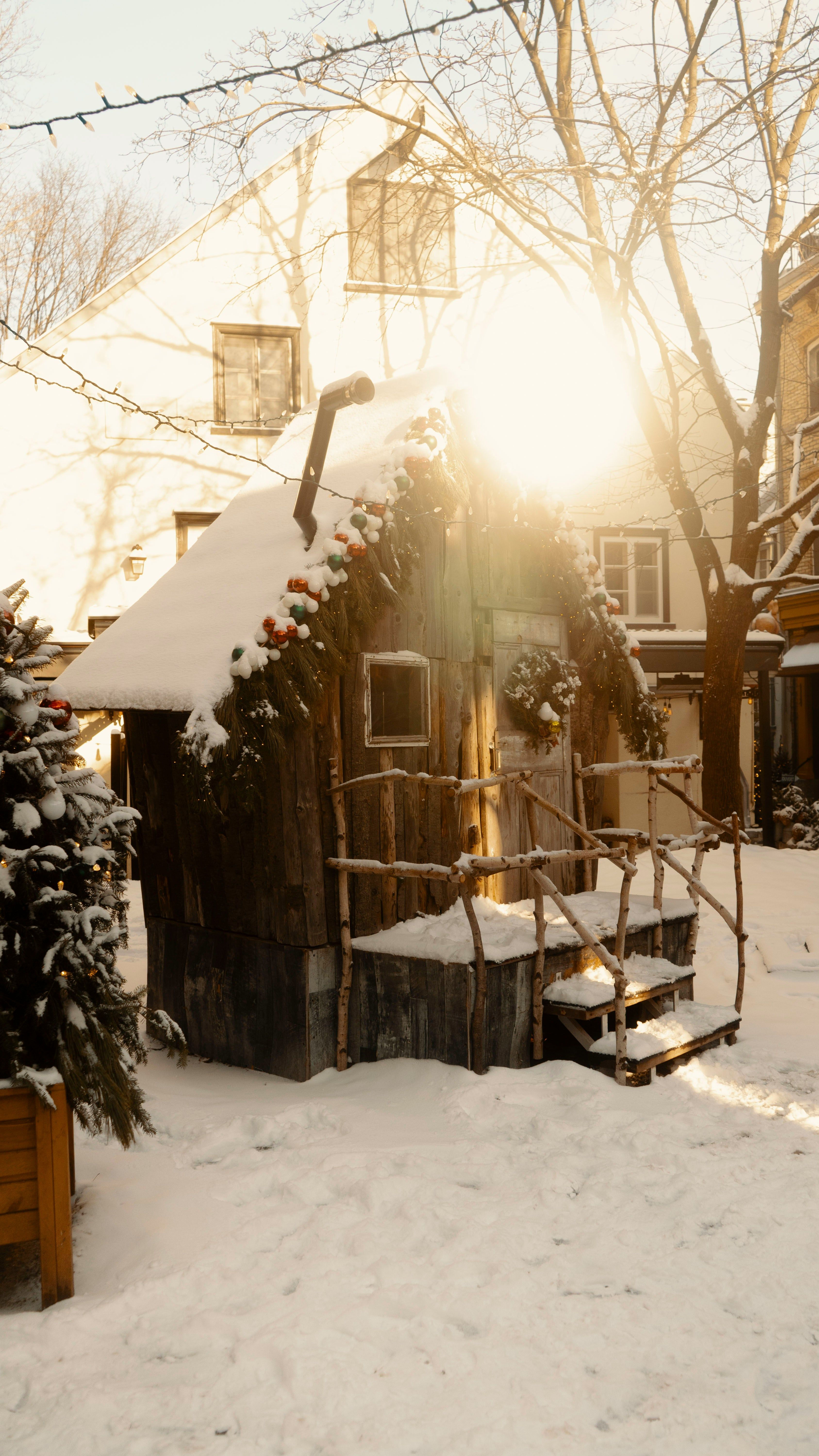 Charming Snow-Covered Rustic Cottage in Winter · Free Stock Photo
