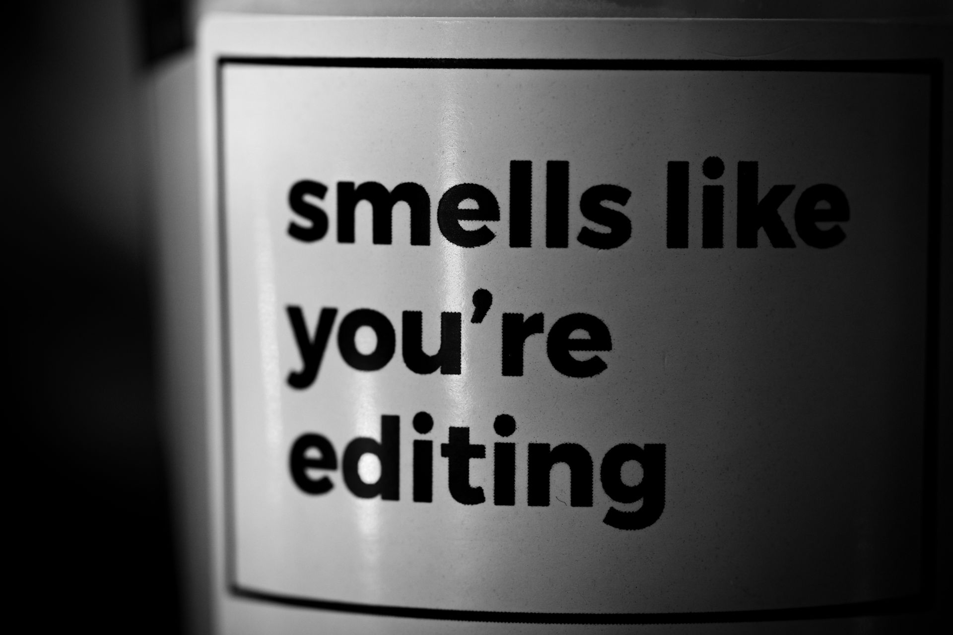 Black and white image with a humorous text about editing, perfect for creative inspiration and design projects.
