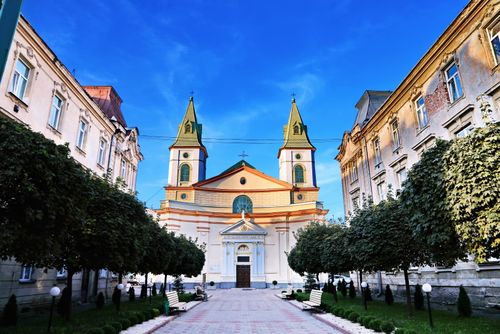 Free Stunning view of a historic church between buildings in Lviv, Ukraine. Stock Photo