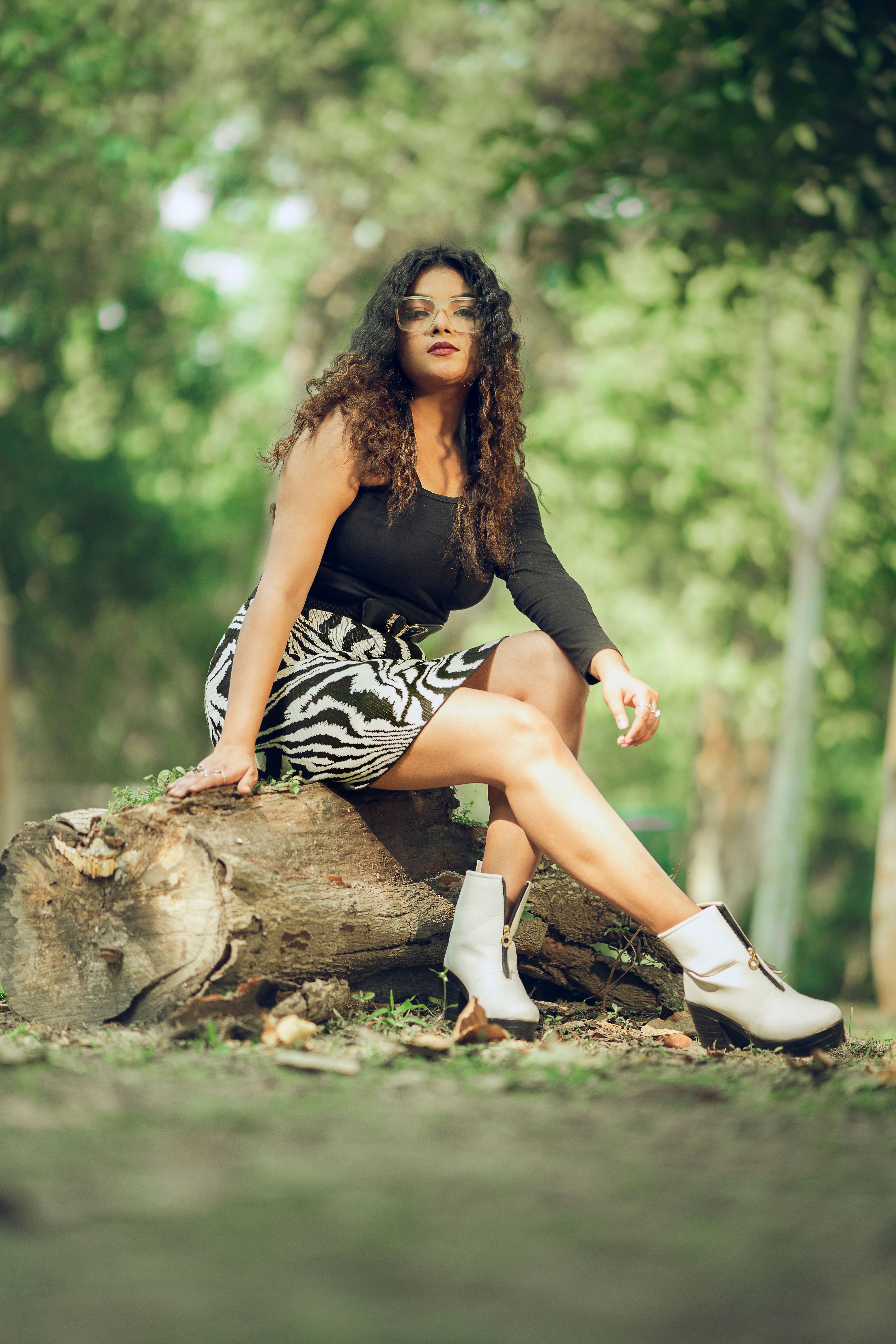 Stylish Woman Posing in a Natural Setting · Free Stock Photo