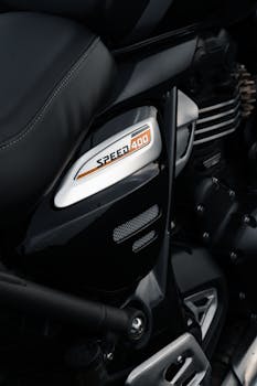 Detailed view of motorcycle engine parts in Bengaluru, showcasing Speed 400 model.