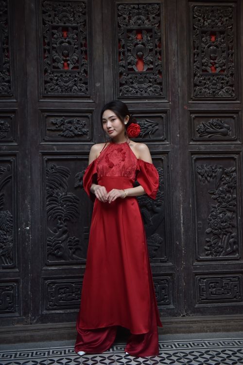 Elegant Woman in Red Dress by Ornate Door · Free Stock Photo