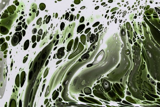 Green and white fluid-art texture — photo by Landiva Weber on Pexels