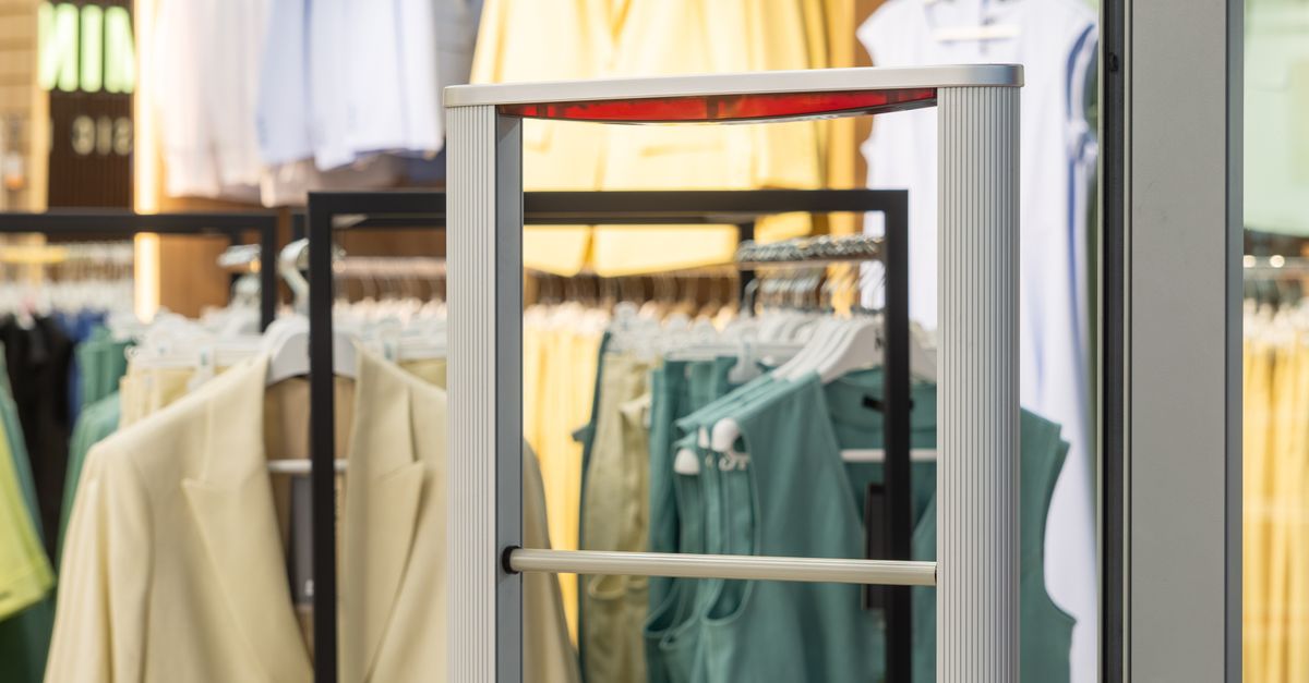 Photo by Aliaksei Smalenski Electronic security gate in a modern clothing store entrance for theft prevention.