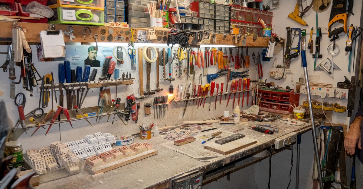 A well-organized workshop in Malta featuring various tools and supplies on display.