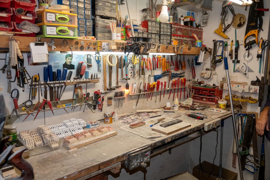 A well-organized workshop in Malta featuring various tools and supplies on display.