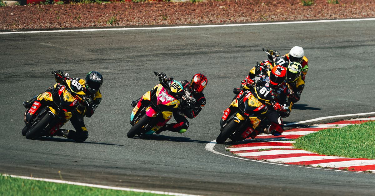 Motorcycle At Races Exciting Motorcycle Race at Rosario Track · Free Stock Photo