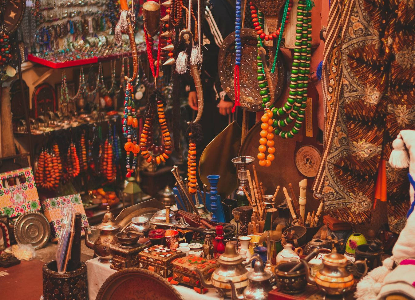 A vibrant Moroccan market showcasing diverse spices and textiles