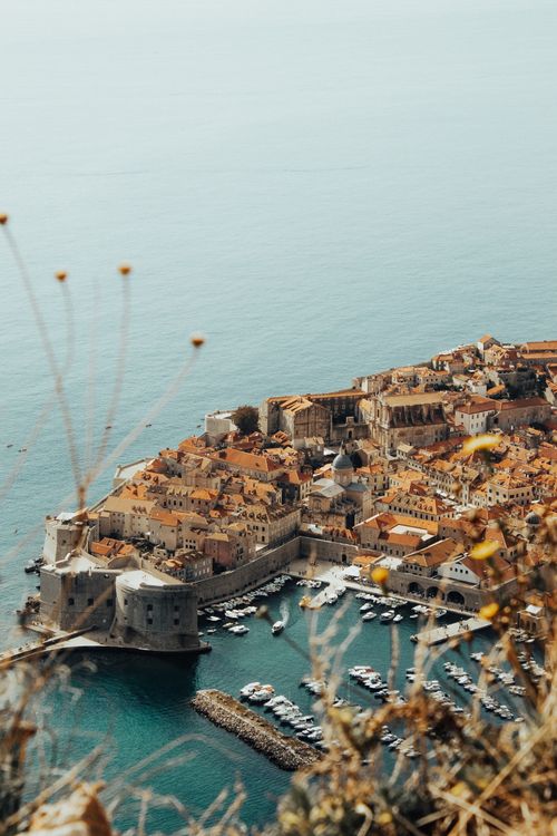 Free Stunning aerial view of Dubrovnik's medieval old town and Adriatic coastline. Stock Photo