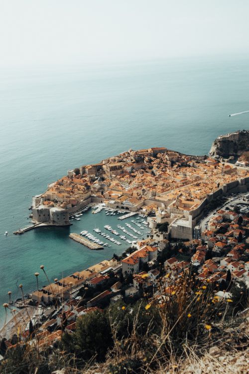 Free Discover the breathtaking aerial view of Dubrovnik's iconic Old Town and Adriatic coastline. Stock Photo