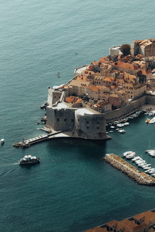Free Stunning aerial view of Dubrovnik's walled Old Town and harbor in Croatia. Stock Photo