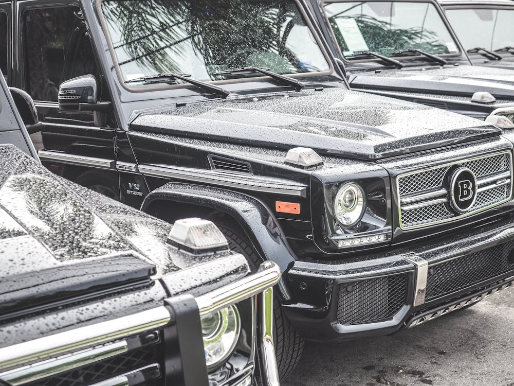 Free Black Cars on Gray Concrete Road Stock Photo