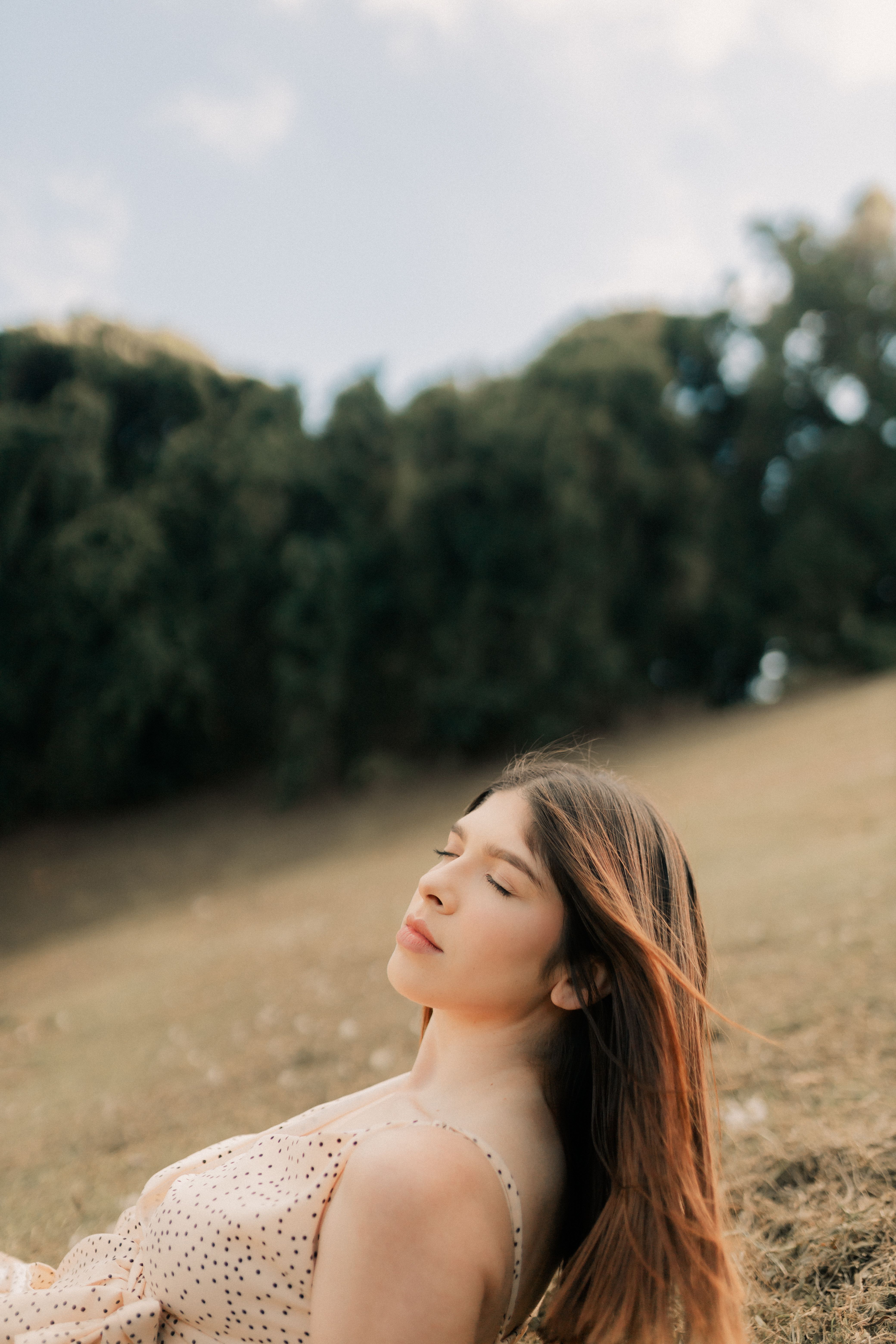 Serene Woman Relaxing in Outdoor Nature · Free Stock Photo
