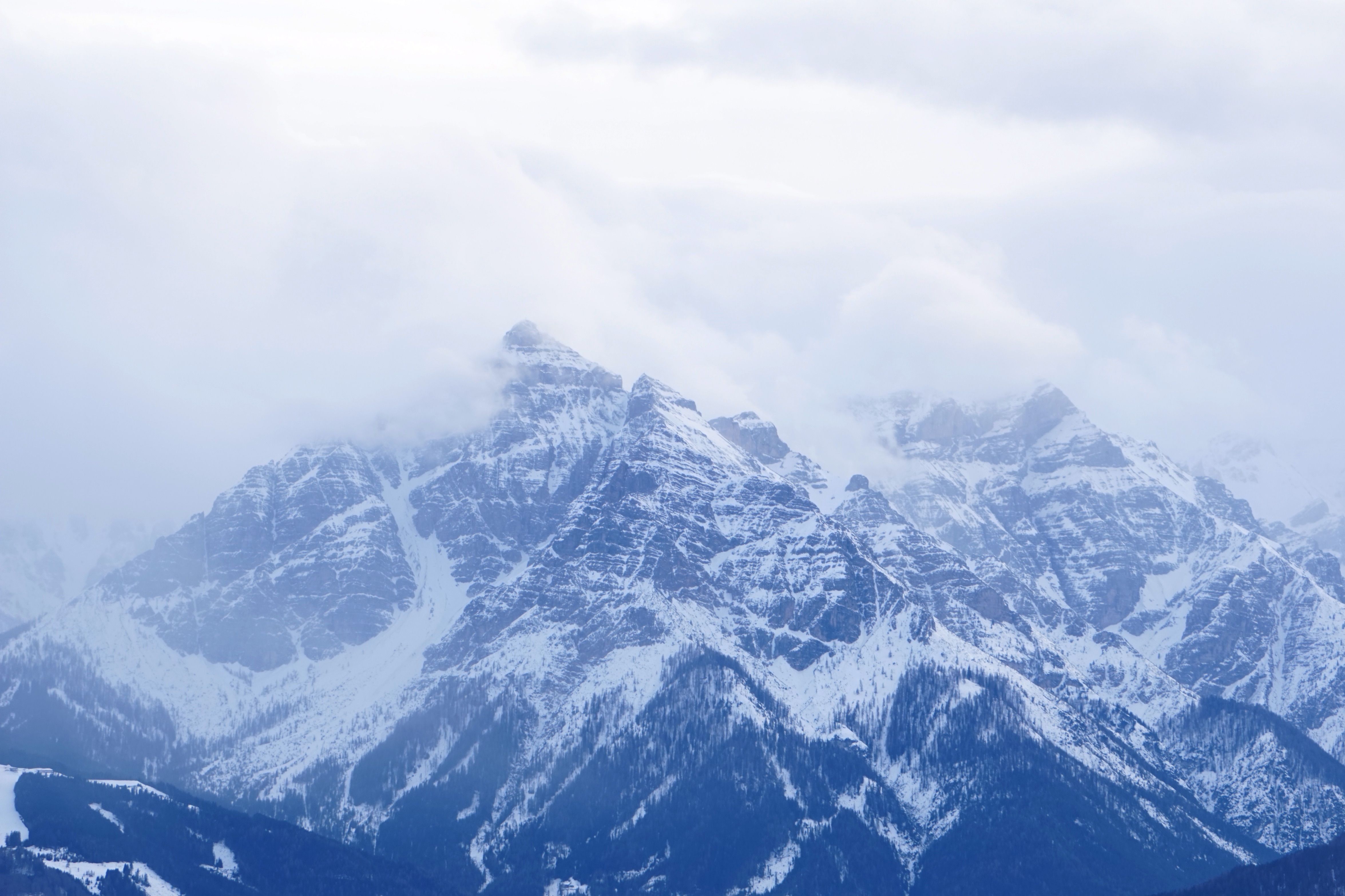 Majestic Snow-Covered Mountain Peaks in Winter · Free Stock Photo