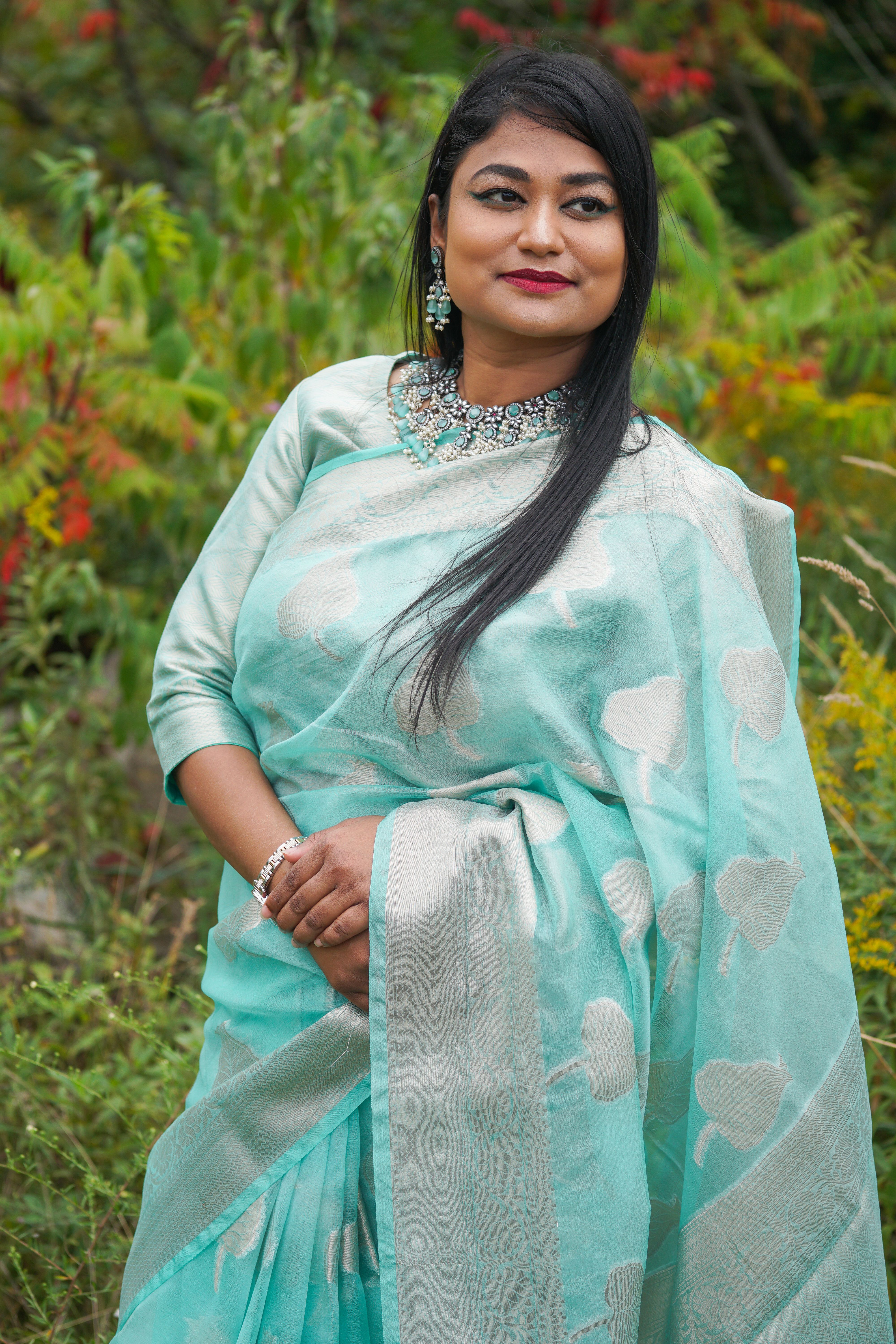 Elegant Woman in Traditional Indian Saree Outdoors · Free Stock Photo