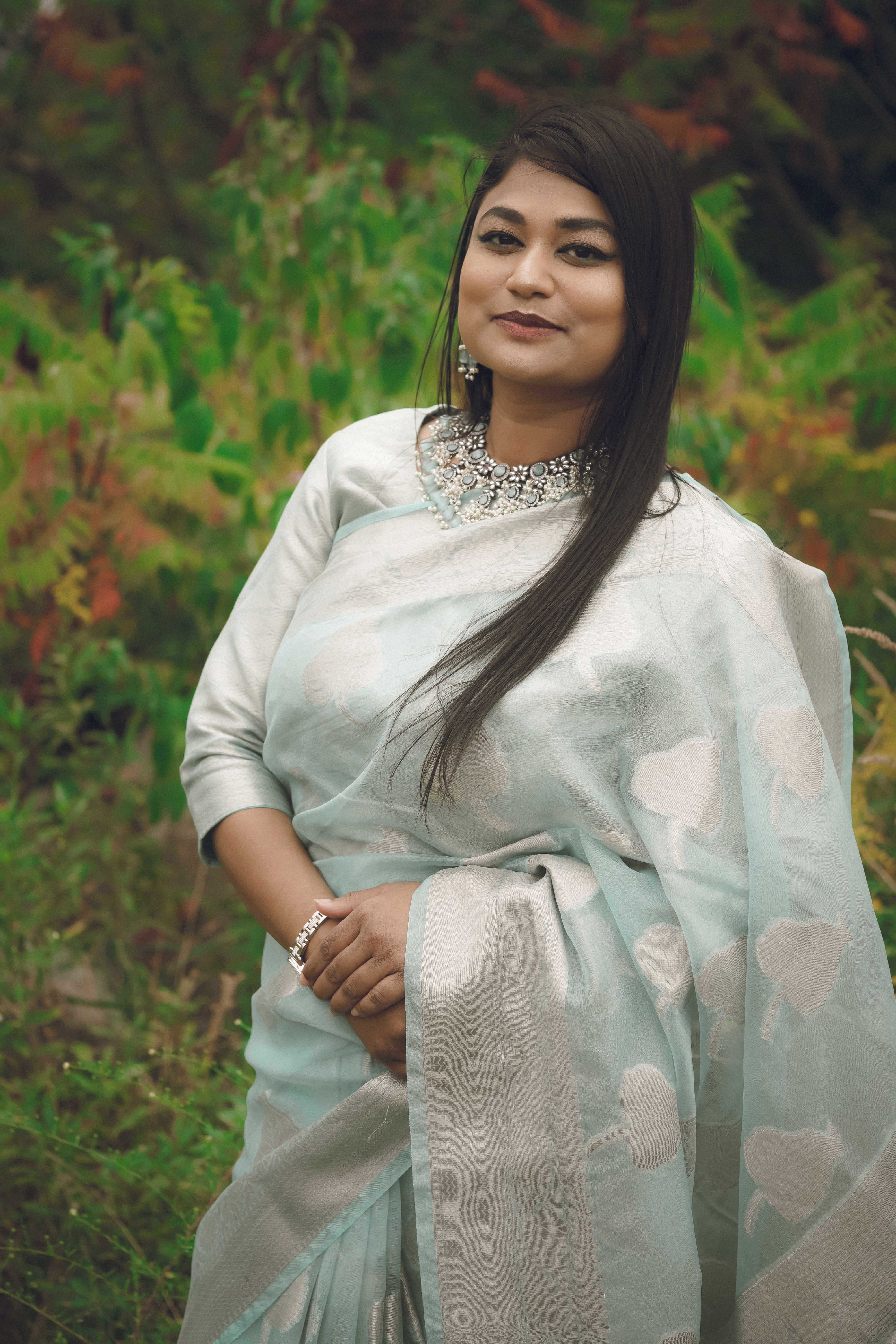 Elegant Woman in Traditional Indian Saree Outdoors · Free Stock Photo