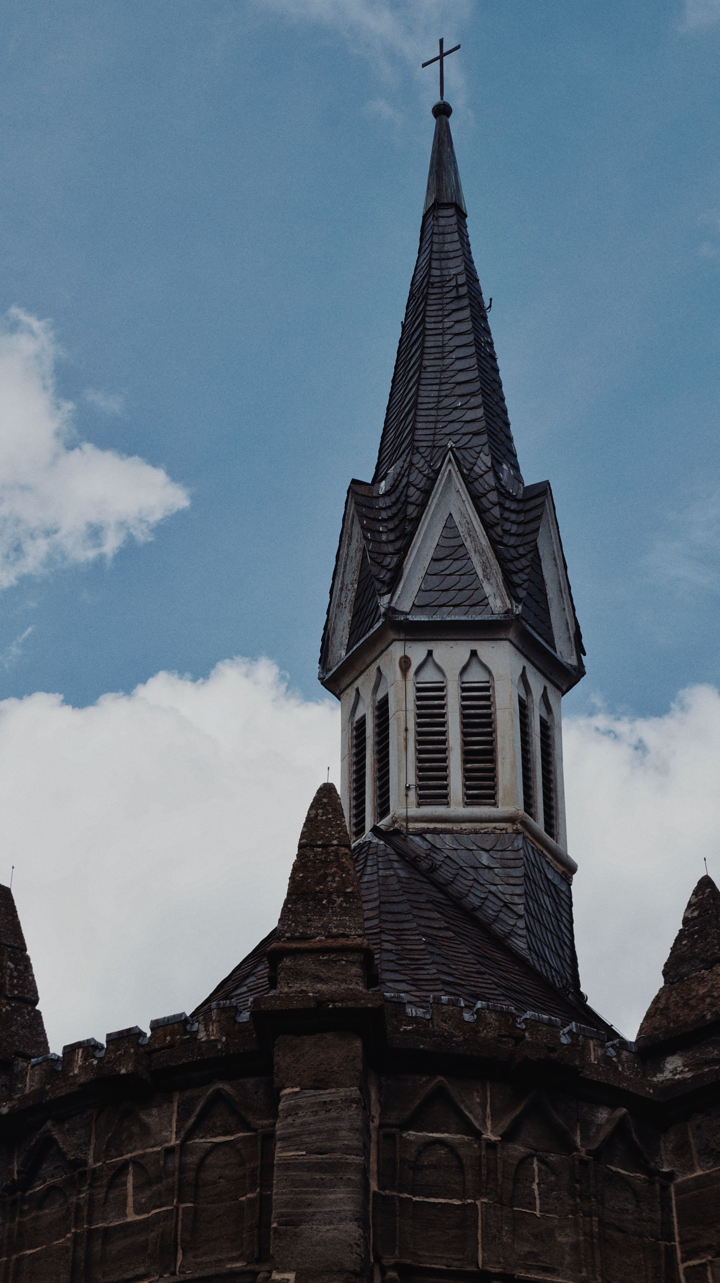 Gothic Church Steeple Against Blue Sky · Free Stock Photo