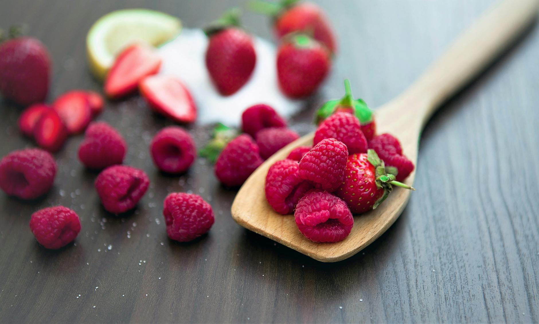 Strawberry raspberry preserves set in jars