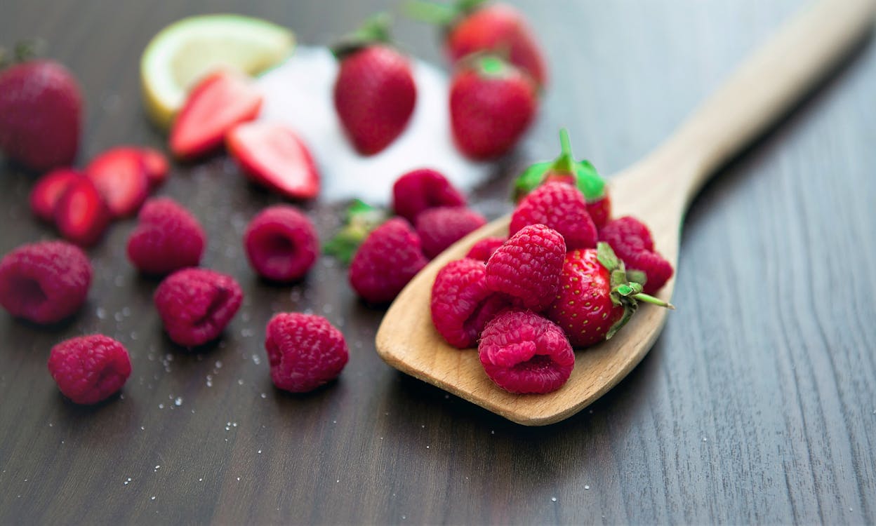 Free Raspberries on Wooden Spoon  Stock Photo