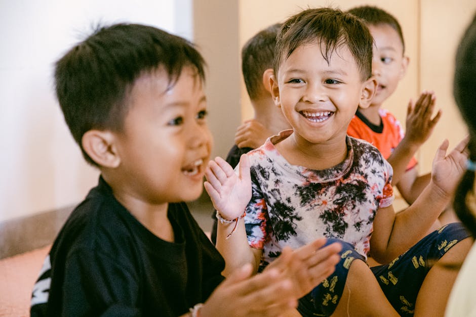 What Are The Best Ways To Foster A Positive Mindset In Children? 10 Children Smiling And Learning Together