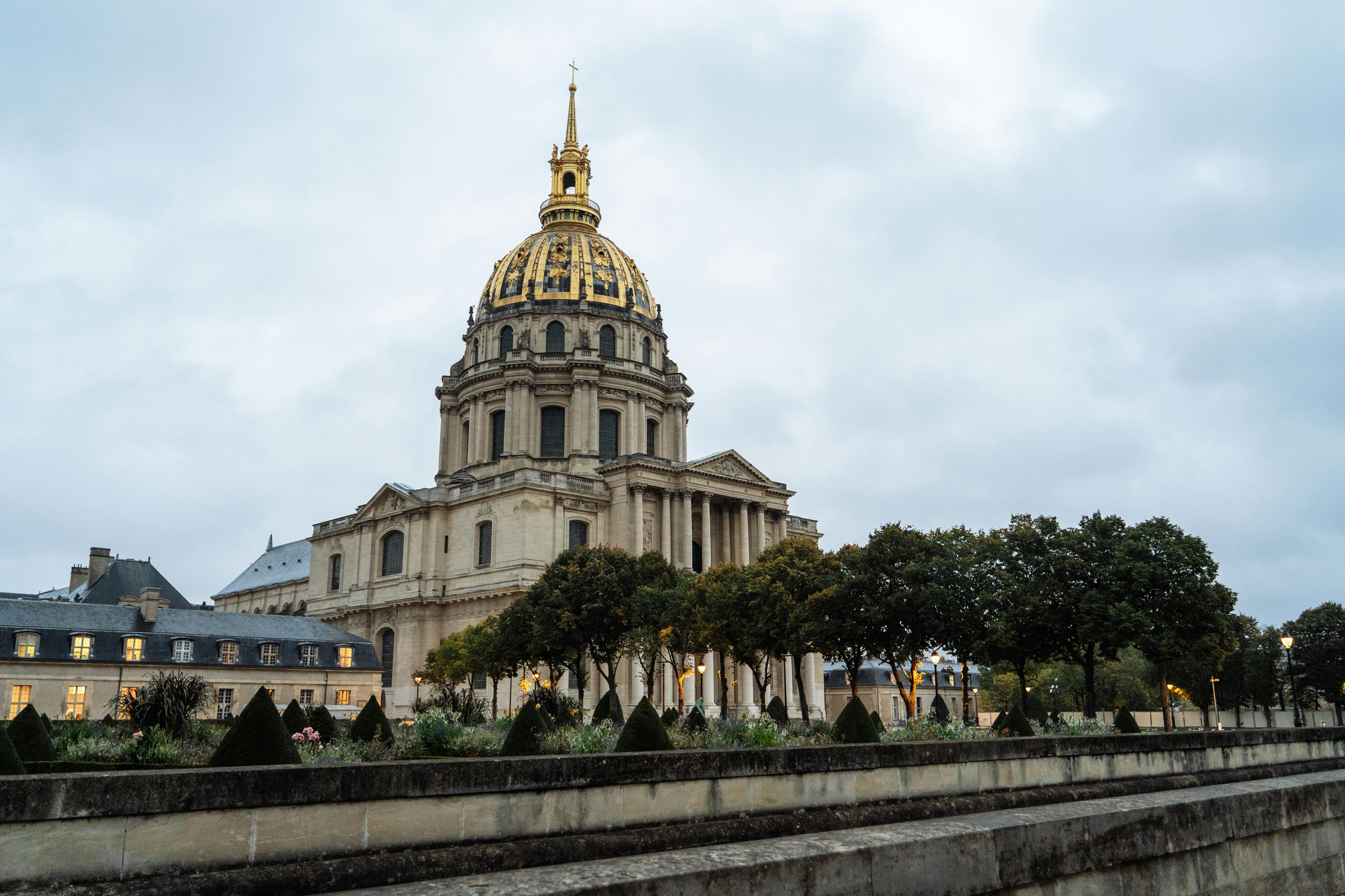Iconic view of the golden dome at Les Invalides in Paris, showcasing French architecture.