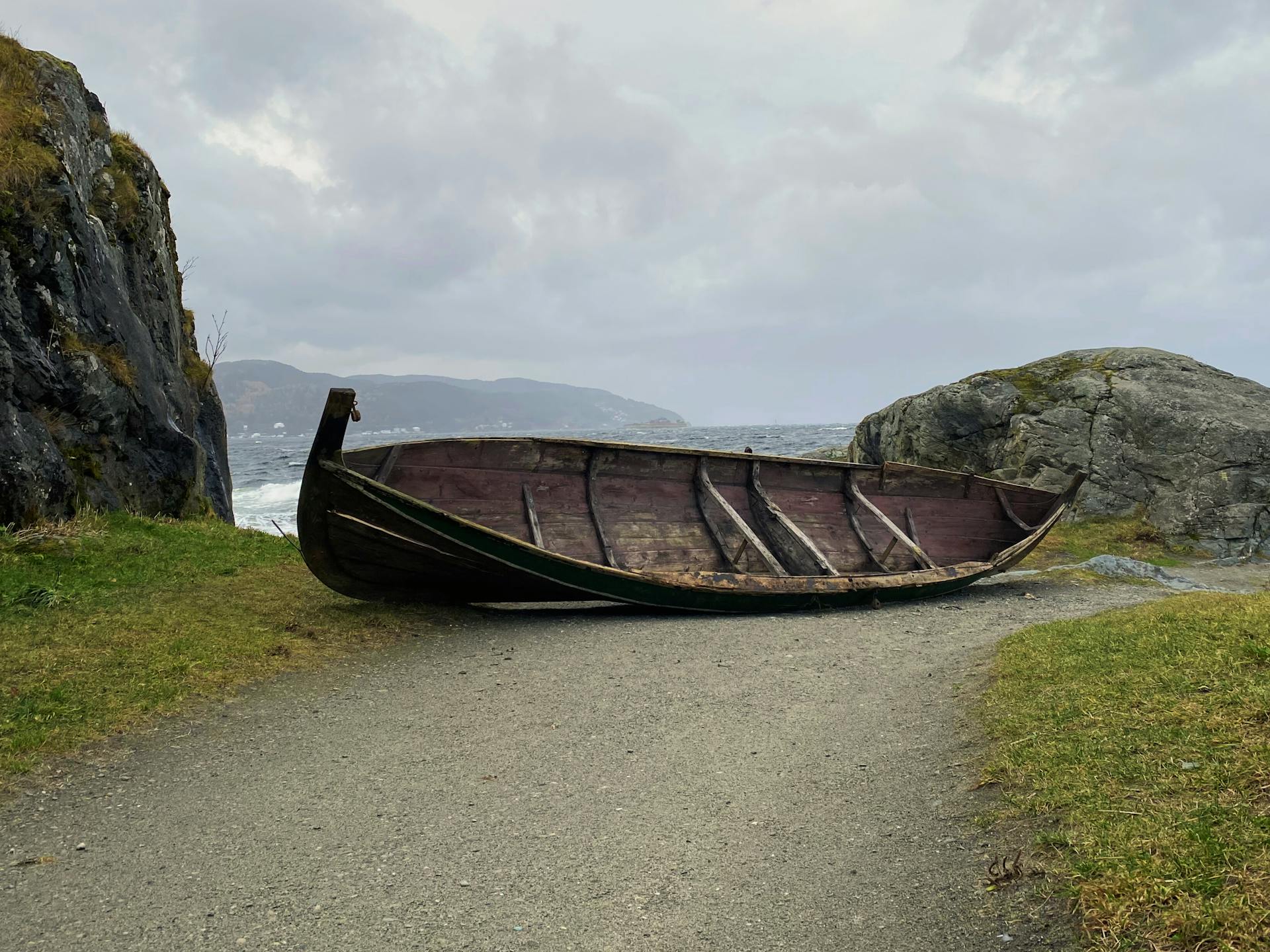 Viking ship on Trondheim's scenic coast, showcasing Norway's maritime heritage.