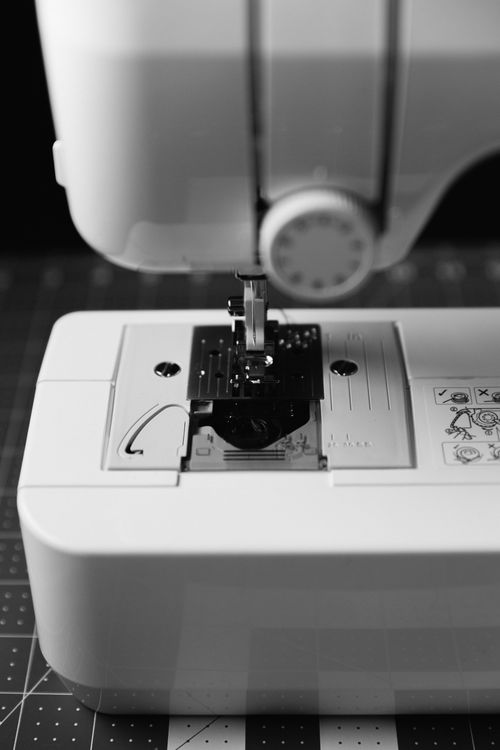 Free Detailed monochrome view of a sewing machine, highlighting craftsmanship tools. Stock Photo