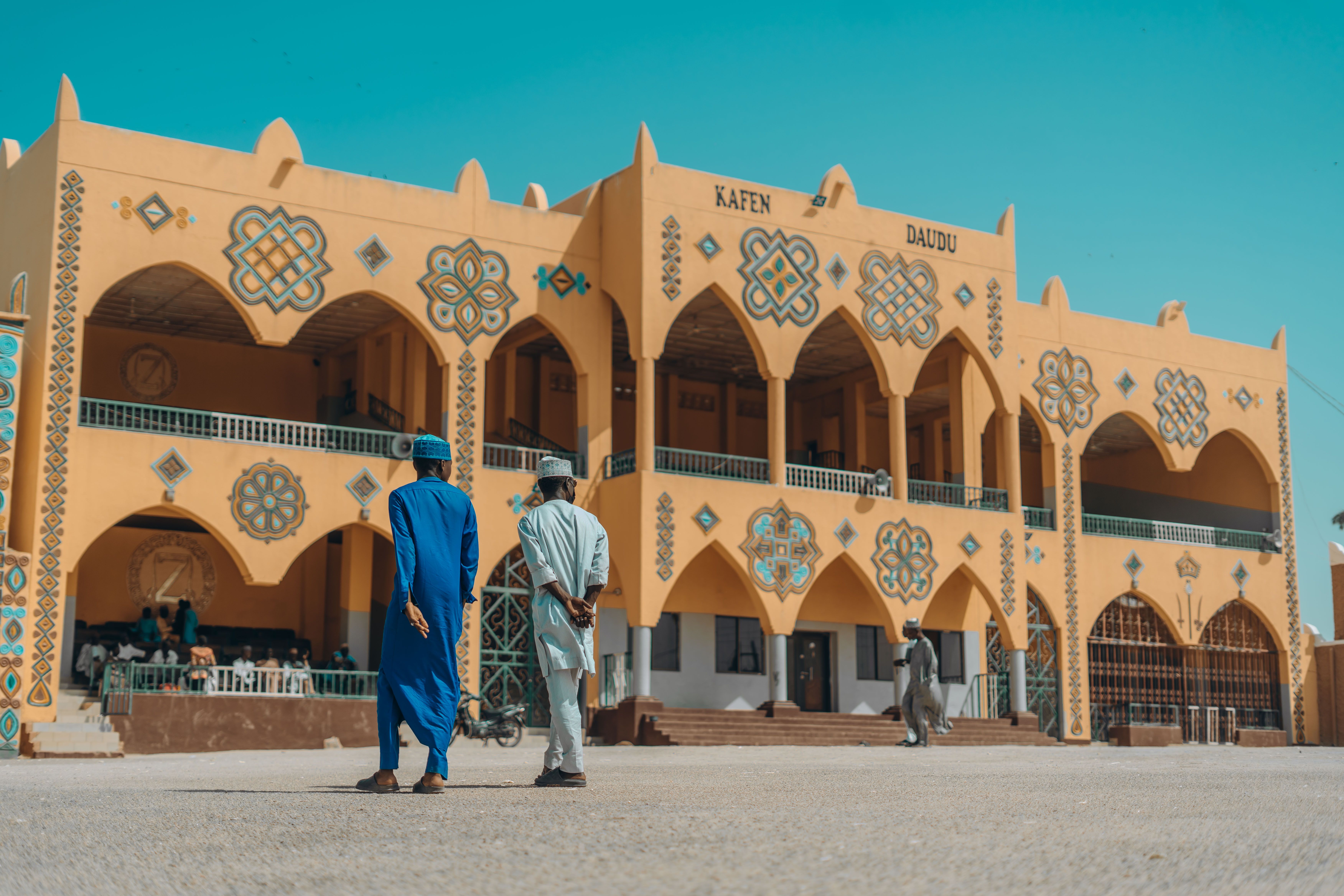Traditional Nigerian Architecture with People · Free Stock Photo