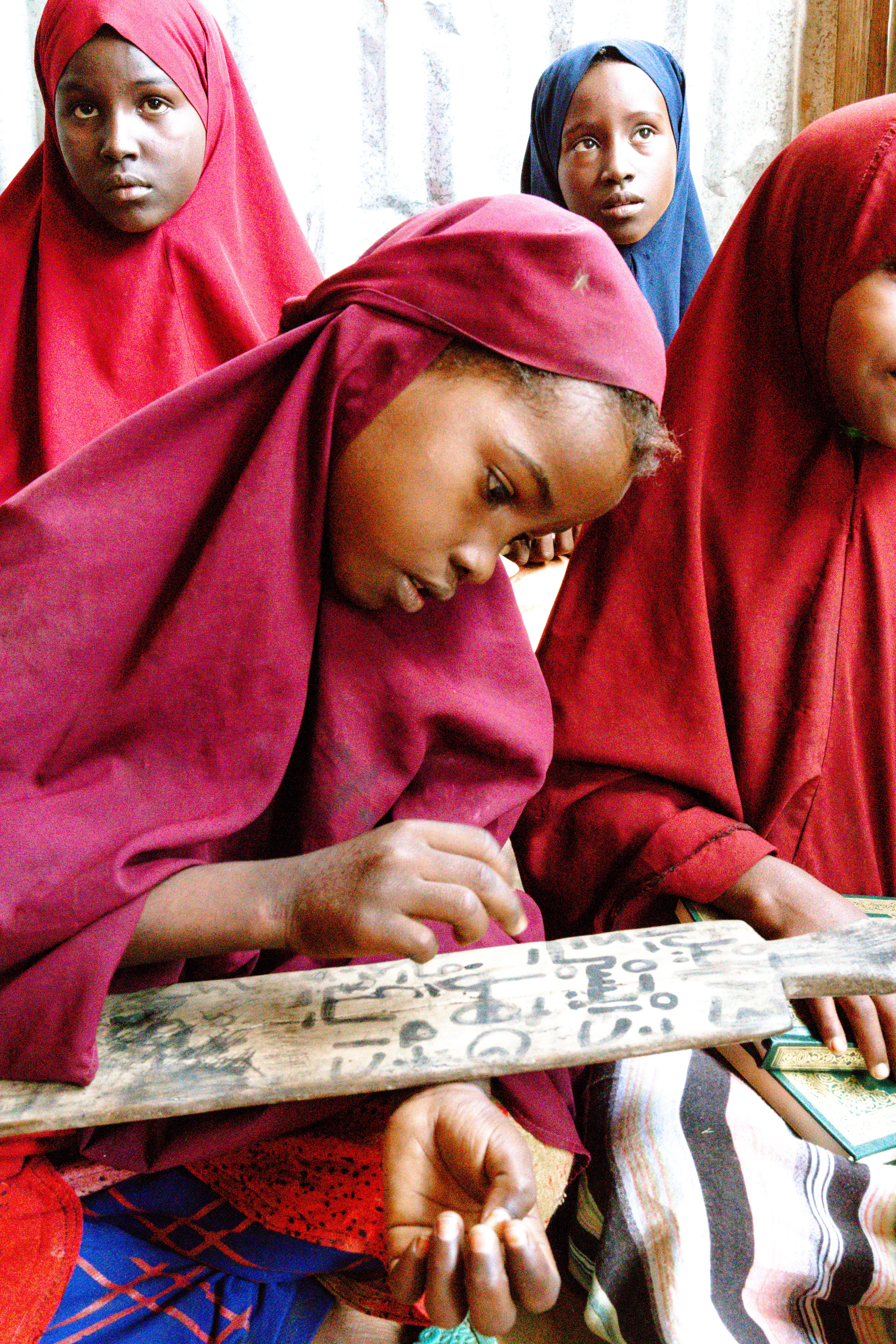 Young Girls Learning in Traditional Classroom · Free Stock Photo