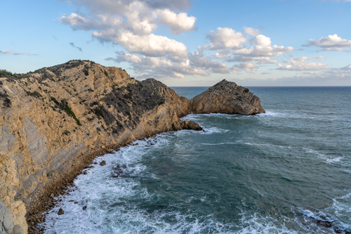 Free Explore the stunning cliffs and waves at Jávea, Valencia, a nature lover's paradise. Perfect for travel and adventure. Stock Photo