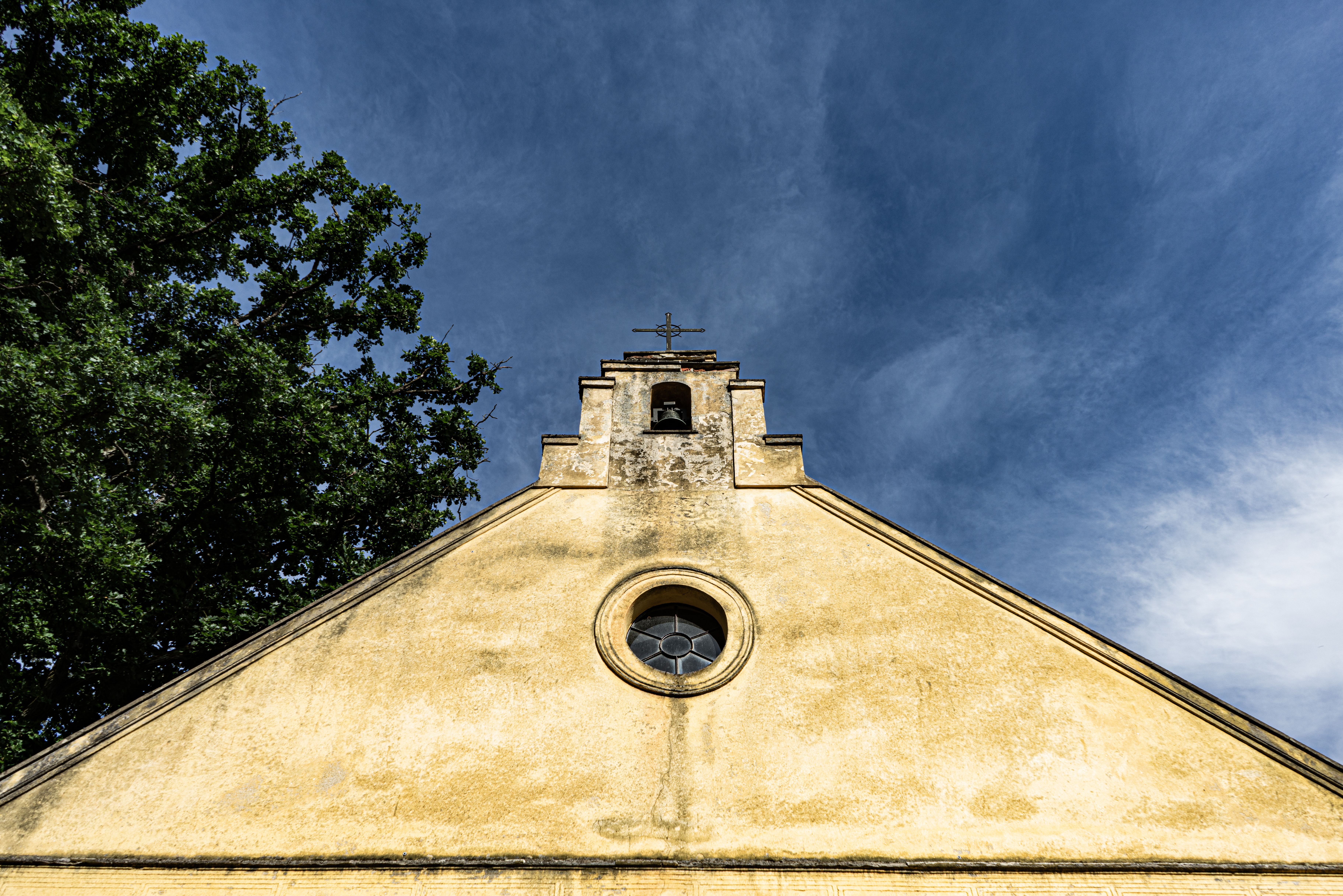 Historic Church Facade Under Blue Sky · Free Stock Photo
