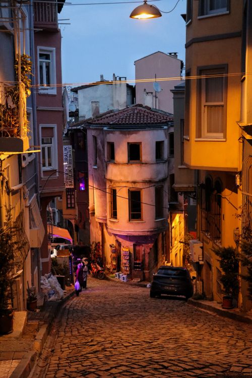Free Charming cobblestone street at twilight in historic town. Stock Photo