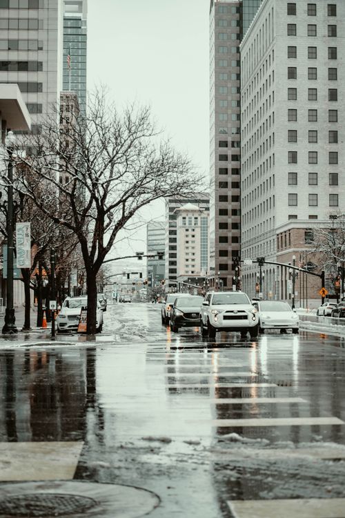 Free A snowy winter day in downtown Salt Lake City with cars and buildings in view. Stock Photo