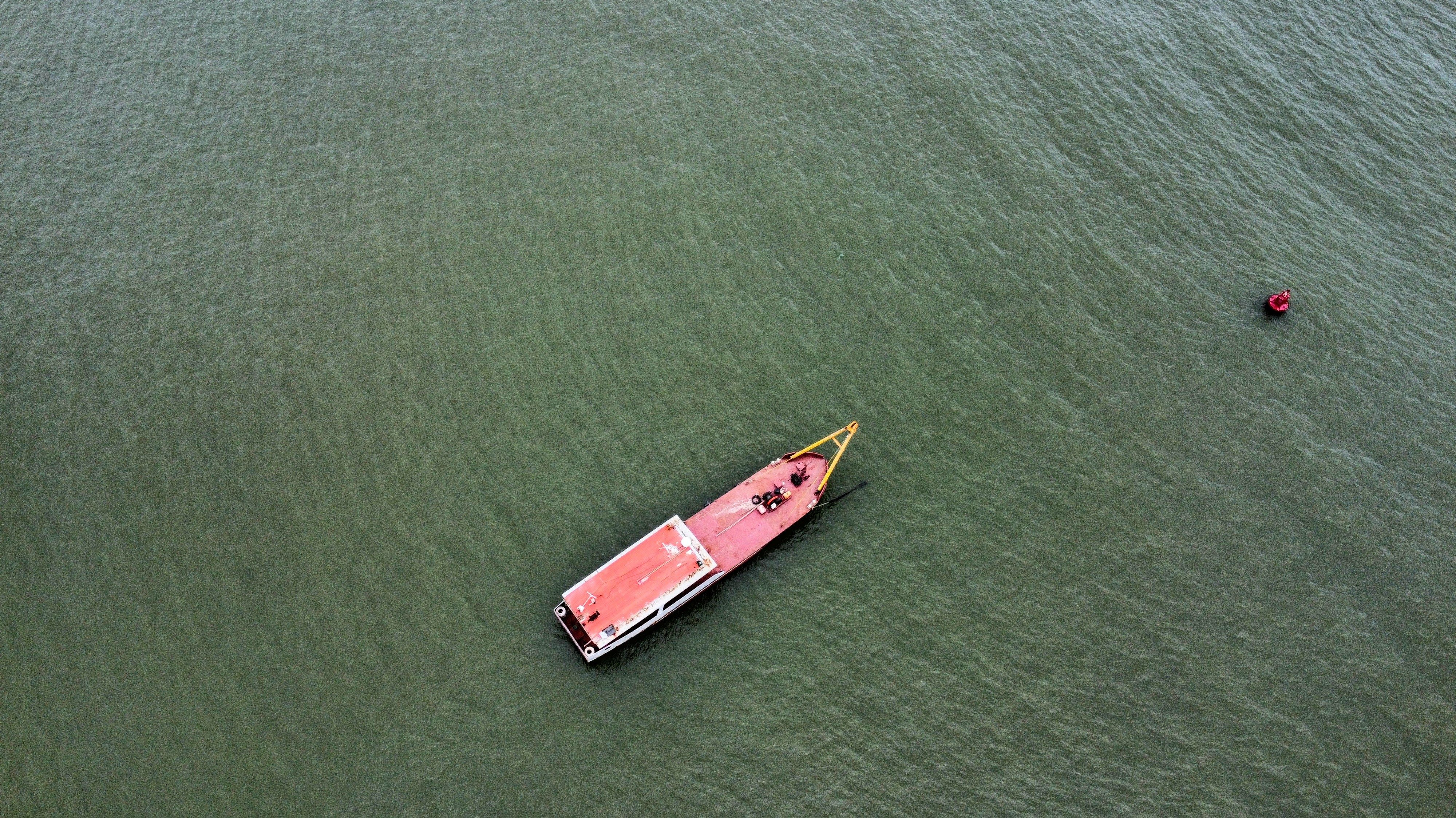Aerial View of a Traditional Fishing Boat on Calm Sea