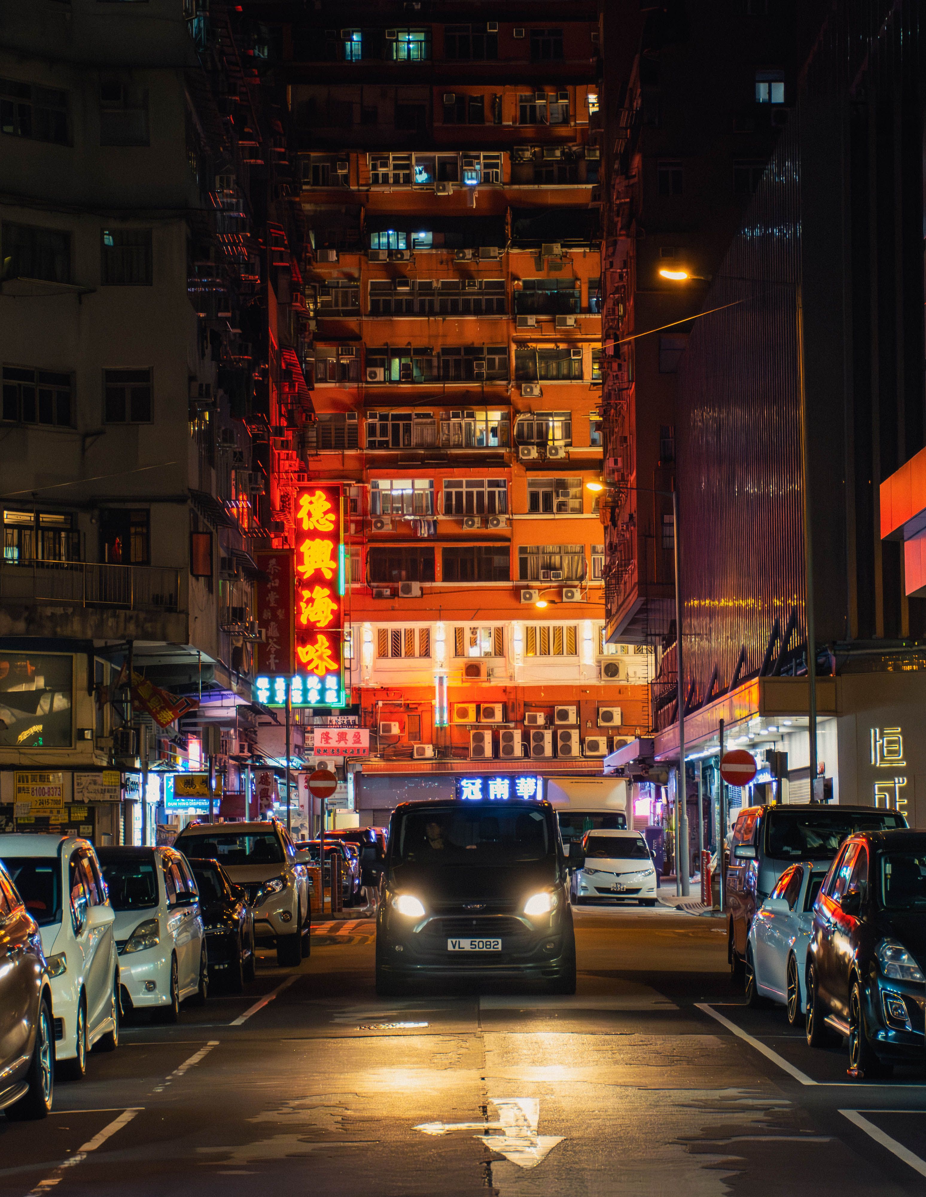 Vibrant Neon-Lit Street in Hong Kong at Night · Free Stock Photo
