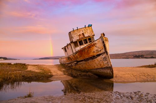 Free A dramatic sunset over the Point Reyes shipwreck in California, USA. Stock Photo
