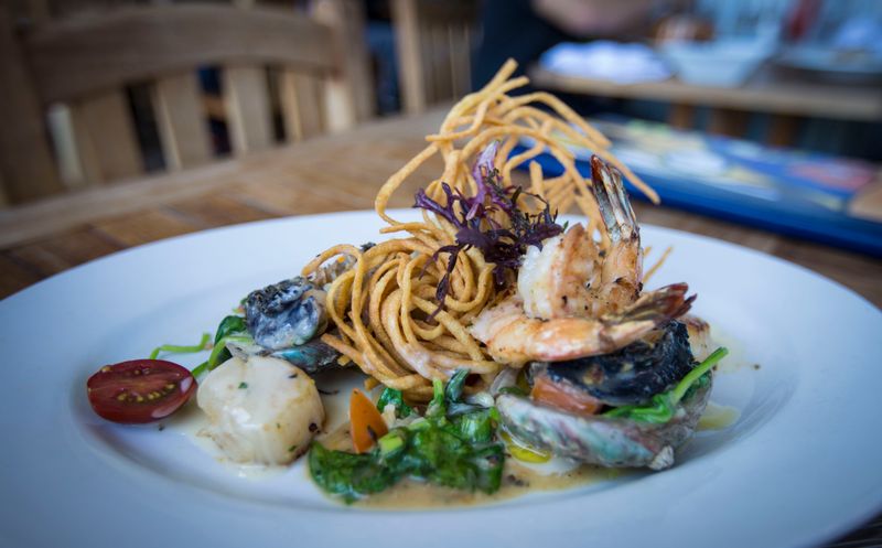Gourmet seafood dish with grilled shrimp