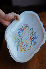 Hand-painted floral ceramic platter, photo by TIVASEE on Pexels