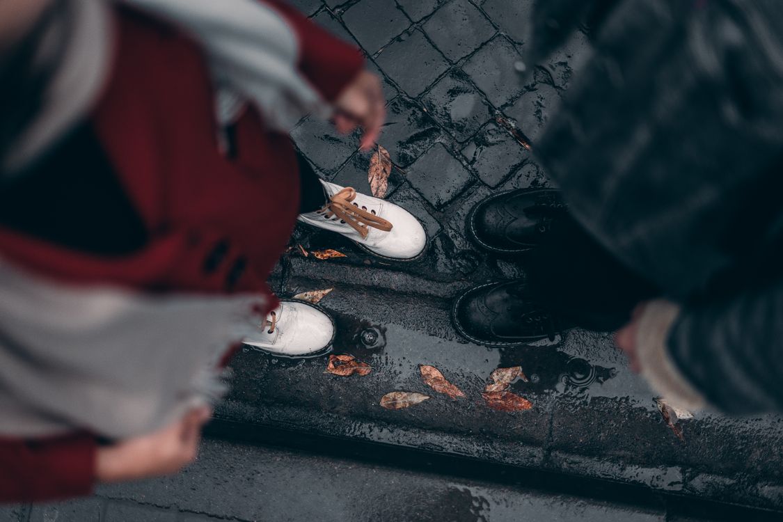 High-Angle Photo of Two People Wearing Shoes · Free Stock Photo
