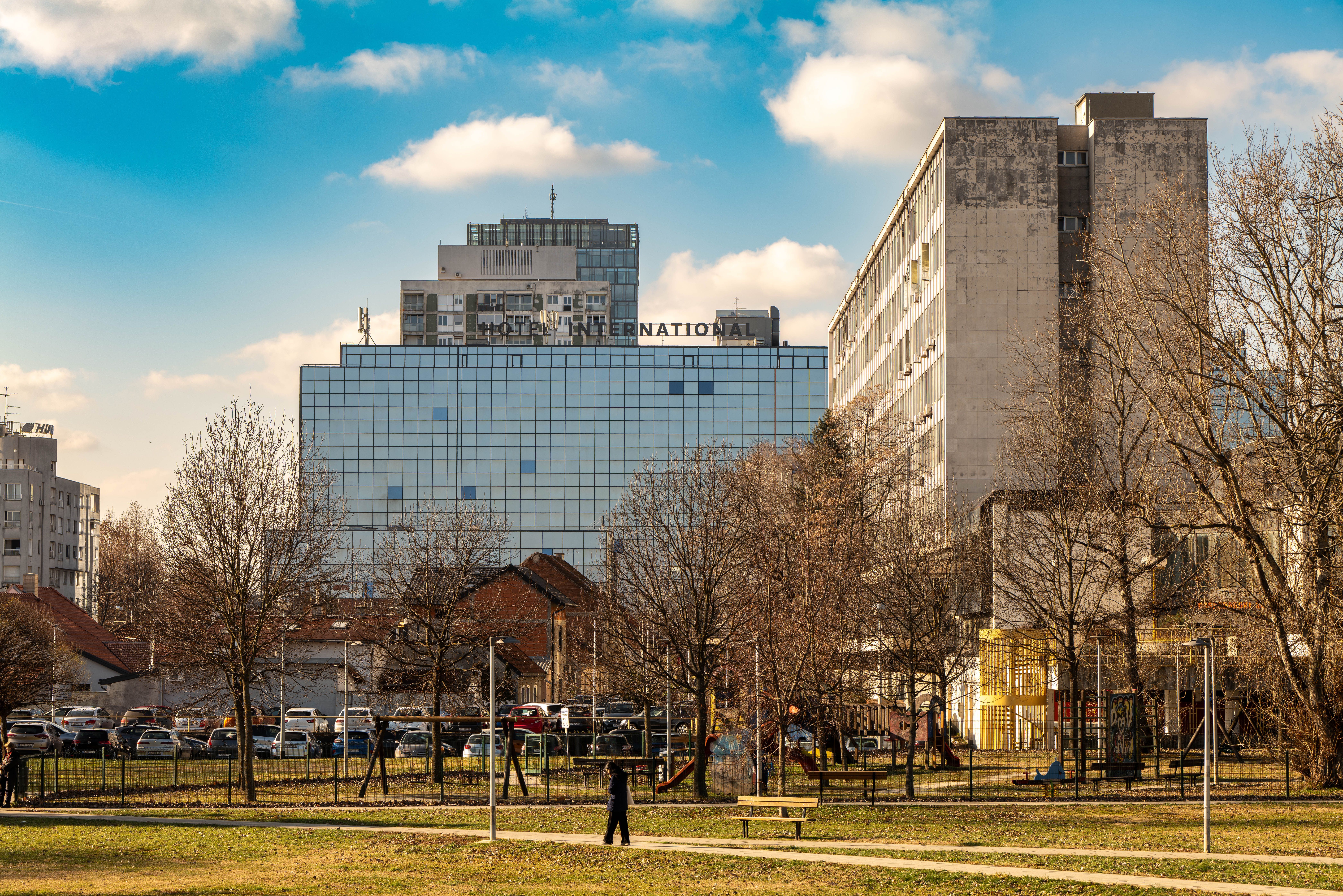 Scenic urban landscape featuring Hotel International in Zagreb on a sunny day.