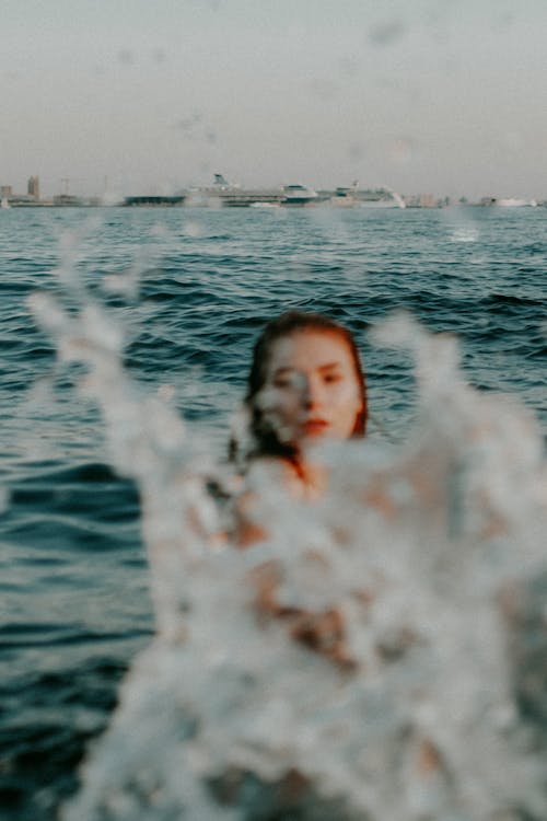 Free Woman on Body of Water Photo Stock Photo