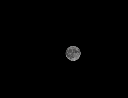 Free A striking full moon captured in the clear night sky over Jerusalem. Stock Photo