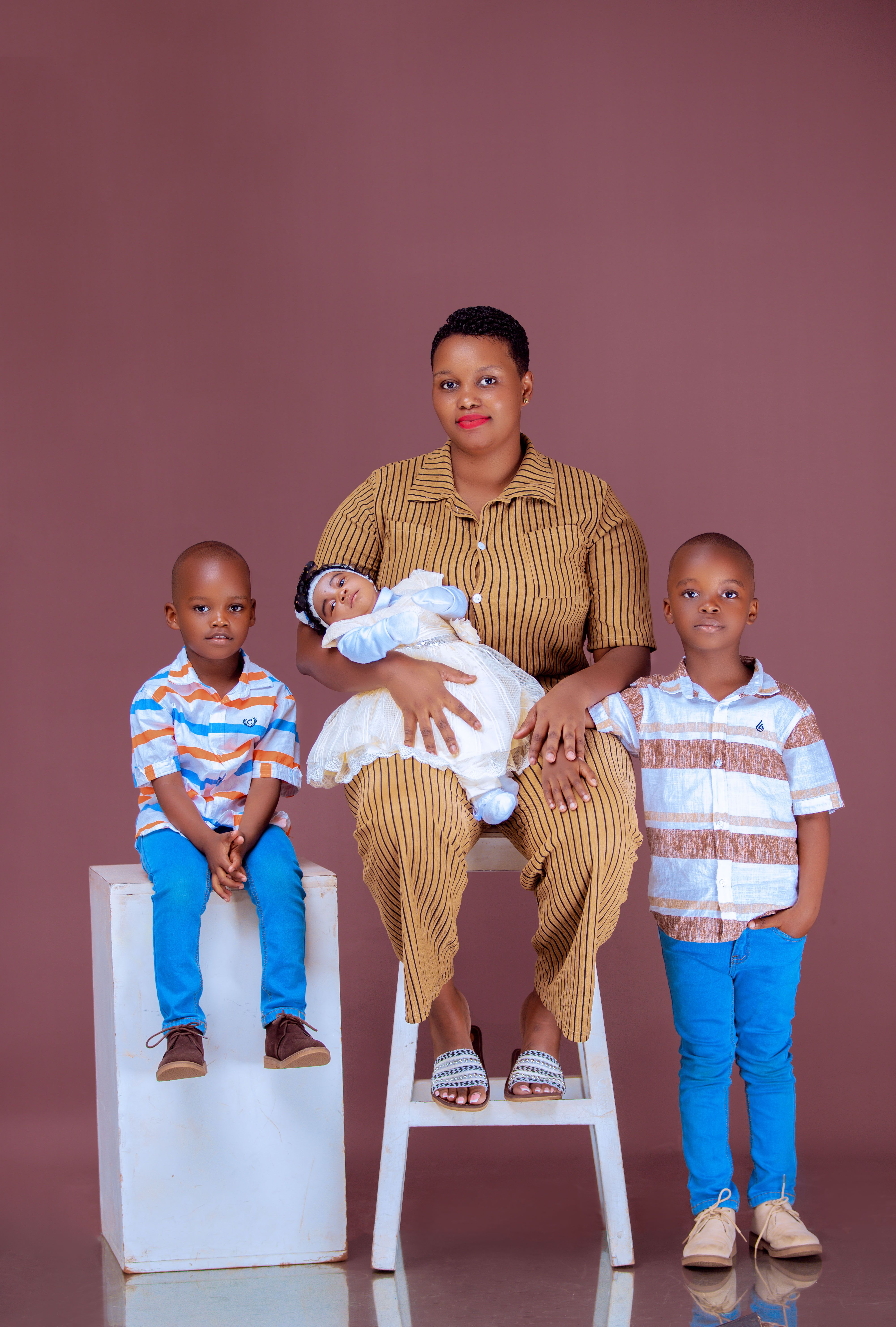 Family Portrait of Mother with Three Children · Free Stock Photo