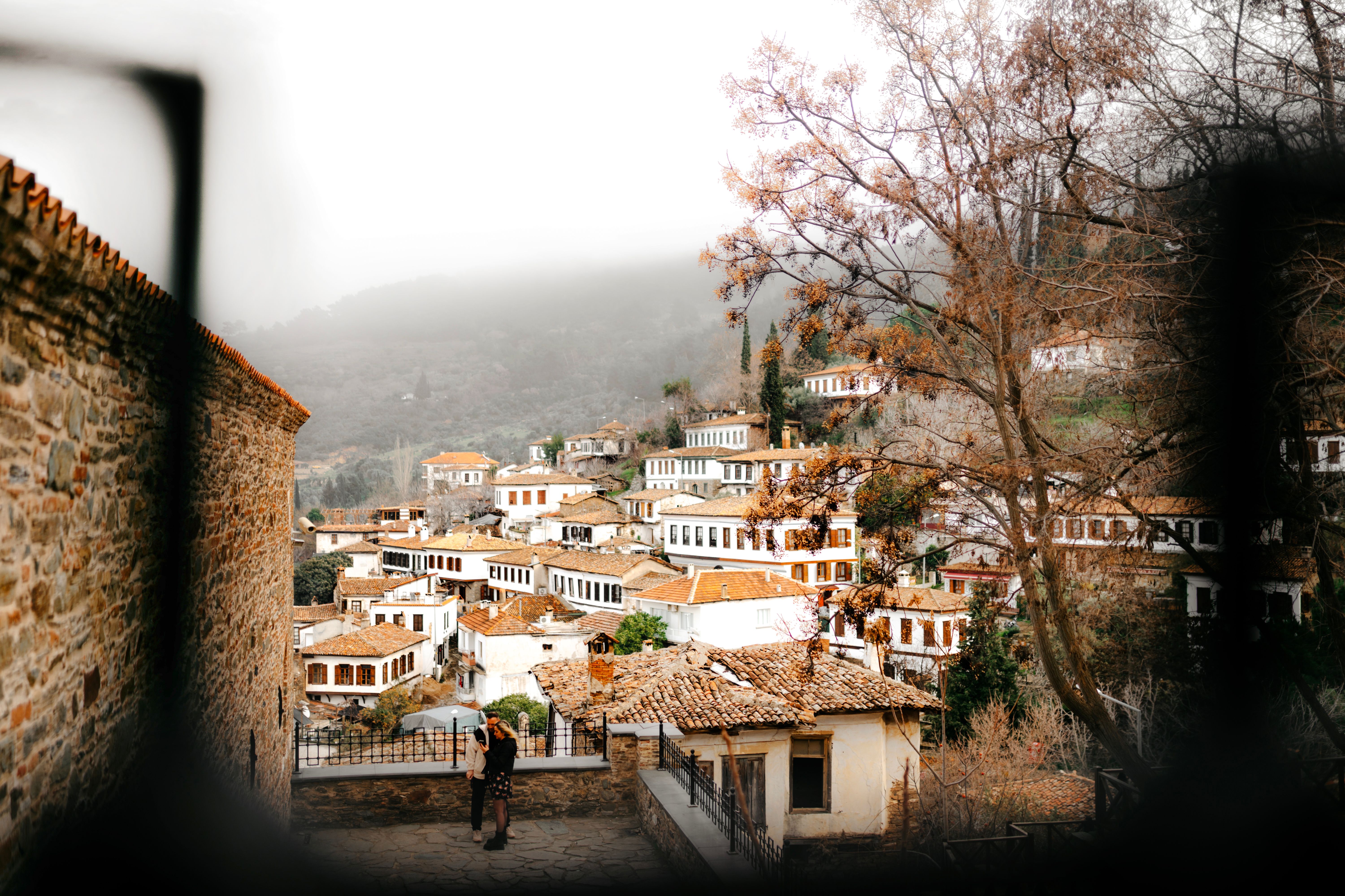 Discover the scenic beauty of Şirince, a tranquil village in winter, showcasing traditional Turkish architecture.