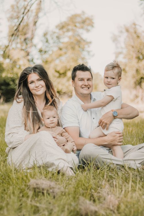 Free A joyful family enjoying a sunny day outdoors in Kansas City, Missouri. Stock Photo