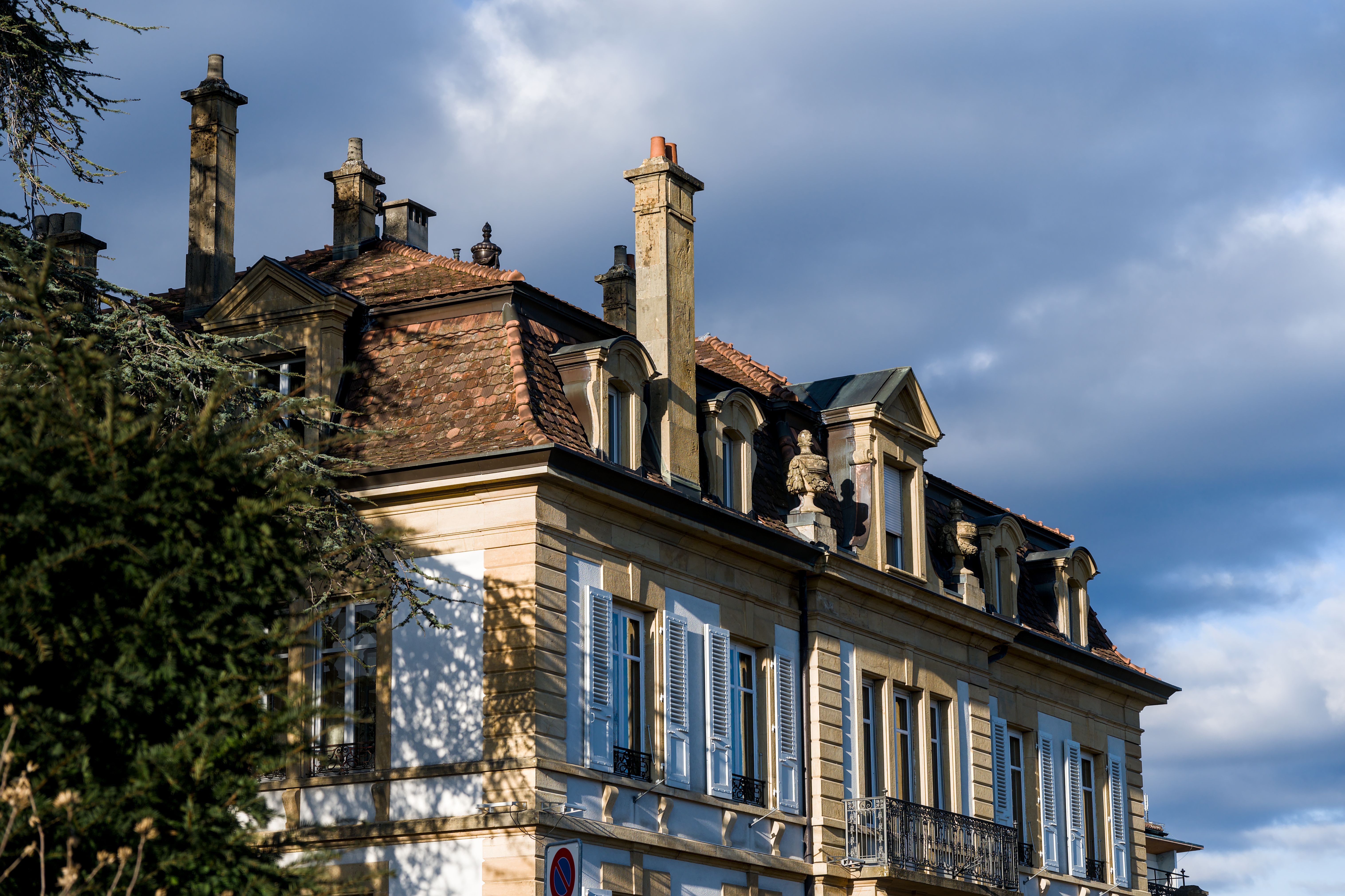 Elegant Historic Building with Chimneys in Neuchâtel · Free Stock Photo
