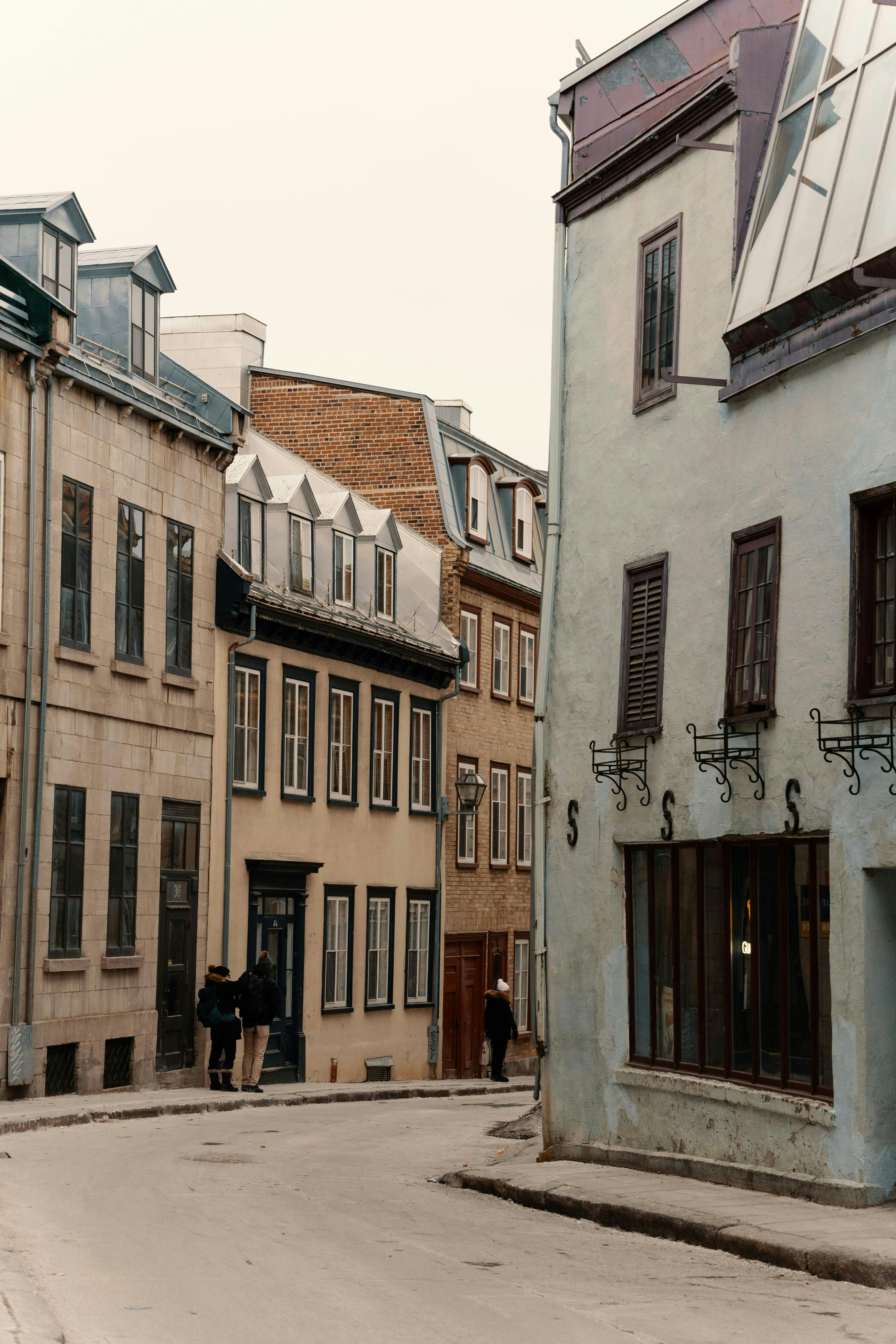 Discover a quaint street in Old Quebec with classic architecture and vintage charm.