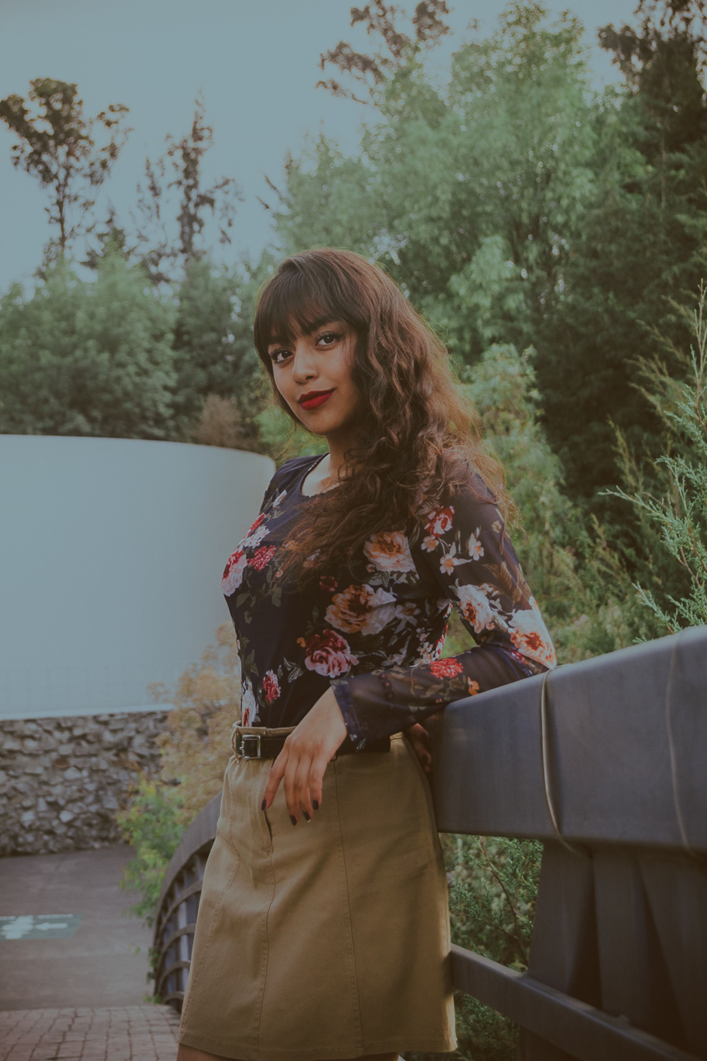 Woman in Floral Top and Skirt Outdoors · Free Stock Photo